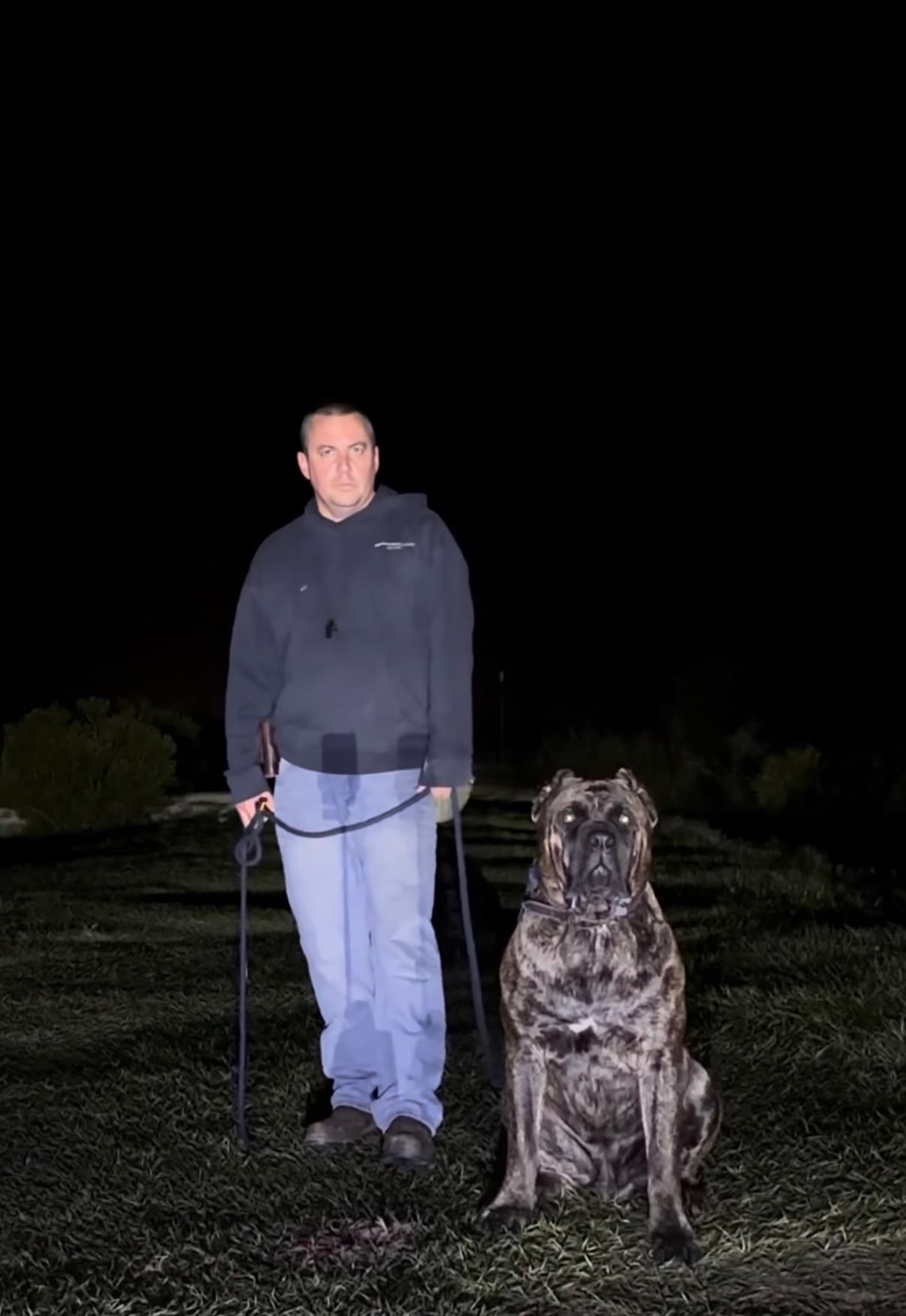 Robert with a dog during an outdoor training session