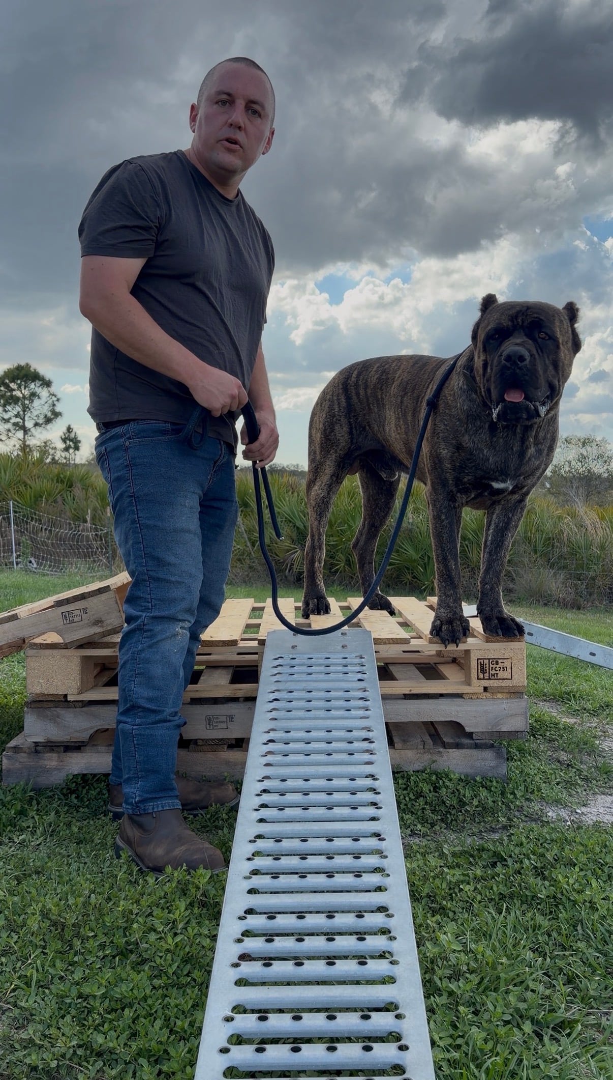 Robert with a Cane Corso standing on a ramp